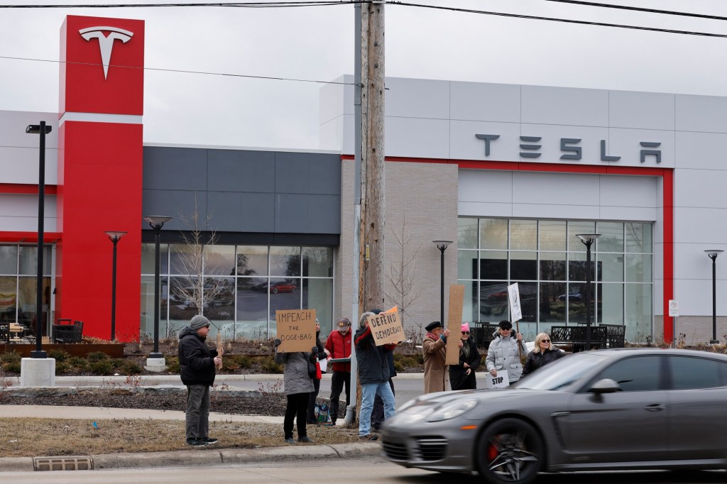 Woman suspected in Colorado Tesla dealership vandalism charged in federal court Woman suspected in Colorado Tesla dealership vandalism charged in federal court
