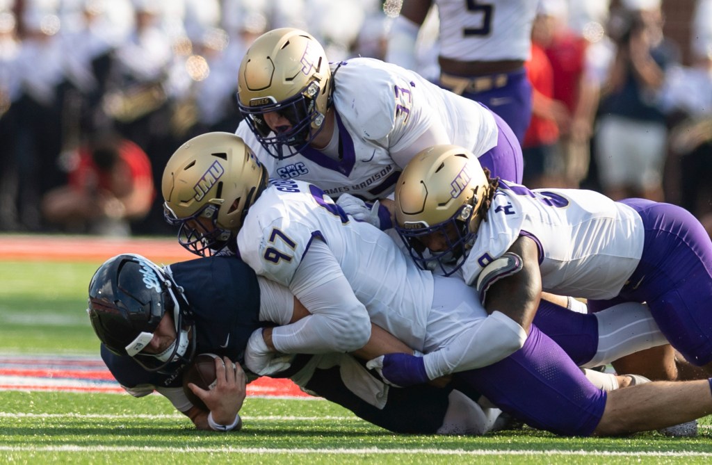 Liberty QB Ethan Vasko, from Oscar Smith, injured as James Madison douses Flames