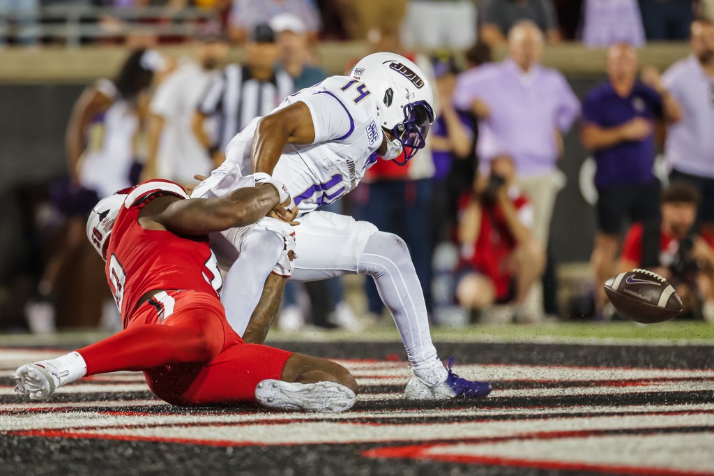 Louisville breaks tie with TD on fumble after sack, turns back James Madison